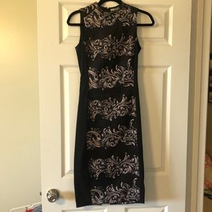 H & M tight black dress w/ light pink design